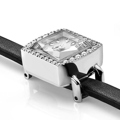 Close-up of zircon square case on a sleek women's watch.