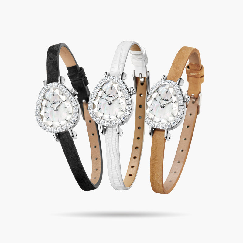 Full view of Sotoiru white ladies' fashion watch: slim leather strap, silver teardrop case with zircon stones, and mother-of-pearl dial.