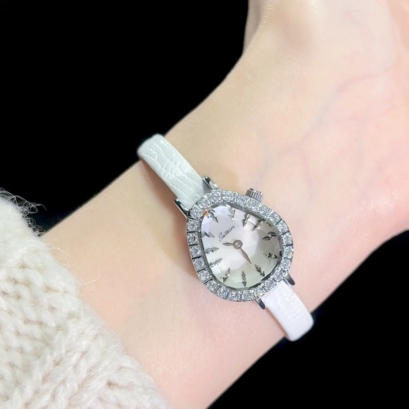 Close-up of Sotoiru women's watch with dew-drop shaped case