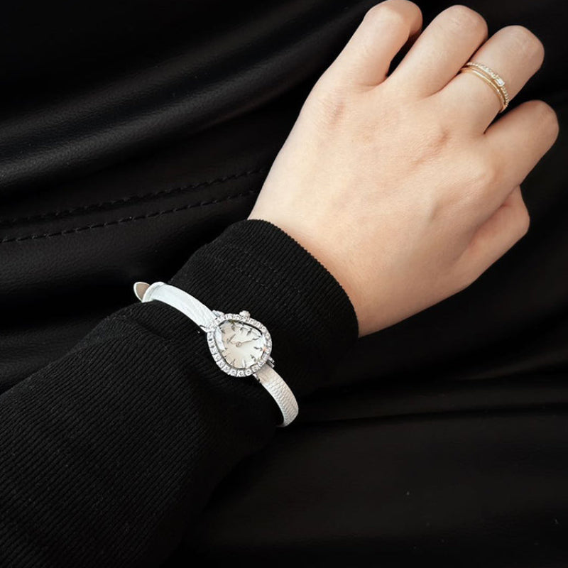 Sotoiru women's watch worn on wrist with mother-of-pearl dial
