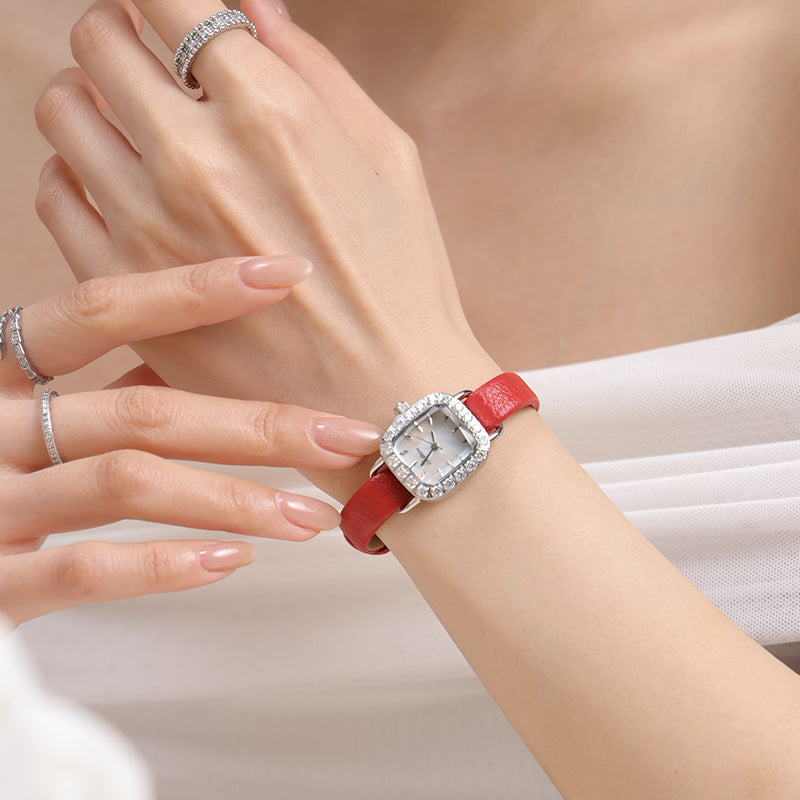 Sotoiru women's watch styled with red interchangeable strap