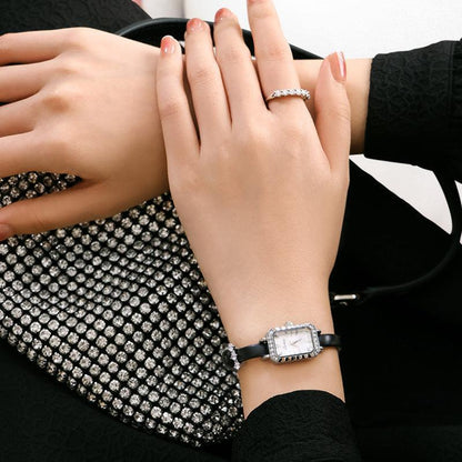 Sotoiru rectangular watch worn on wrist with elegant strap design