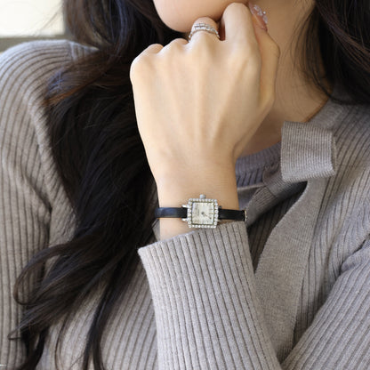Sotoiru square watch worn on wrist with interchangeable strap design
