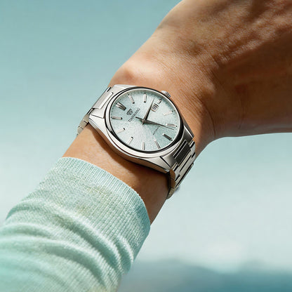 Tianwang automatic watch worn on wrist featuring Misty Valley Green dial